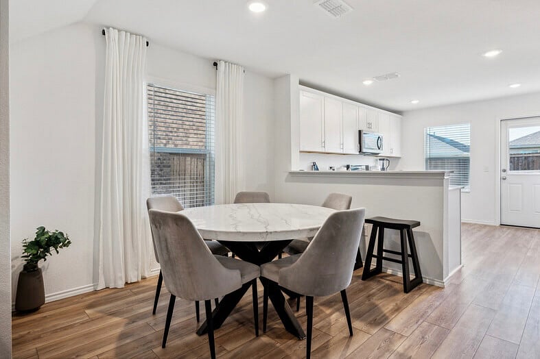 Enjoy dining with this Marble table and West Elm contract grade chairs