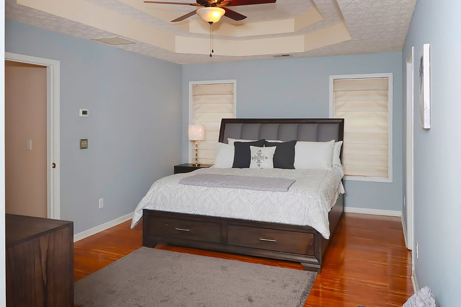 Bedroom with a cozy bed, soft linens, and a peaceful atmosphere for restful sleep.