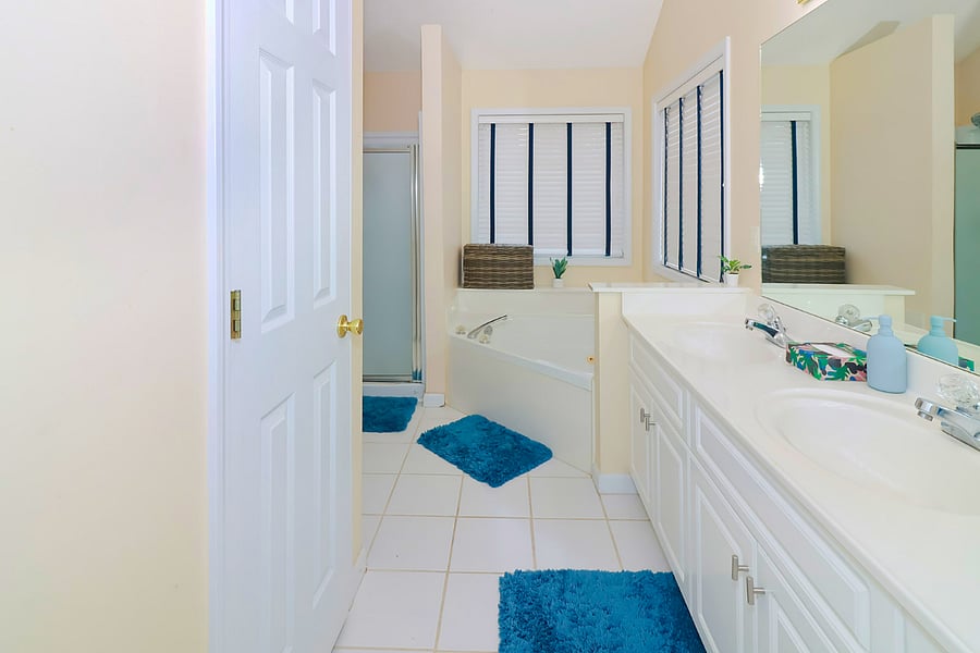 Full bathroom with a soothing tub, modern finishes, and bright, refreshing design for relaxing soaks.