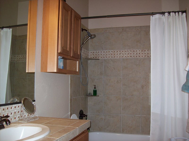 Adjustable shower head with numerous settings, and handheld for convenience, or leave it on the wall for hands free shower
