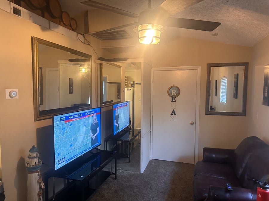55 New Samsung Smart TV. Also New leather recliner sofa. 
