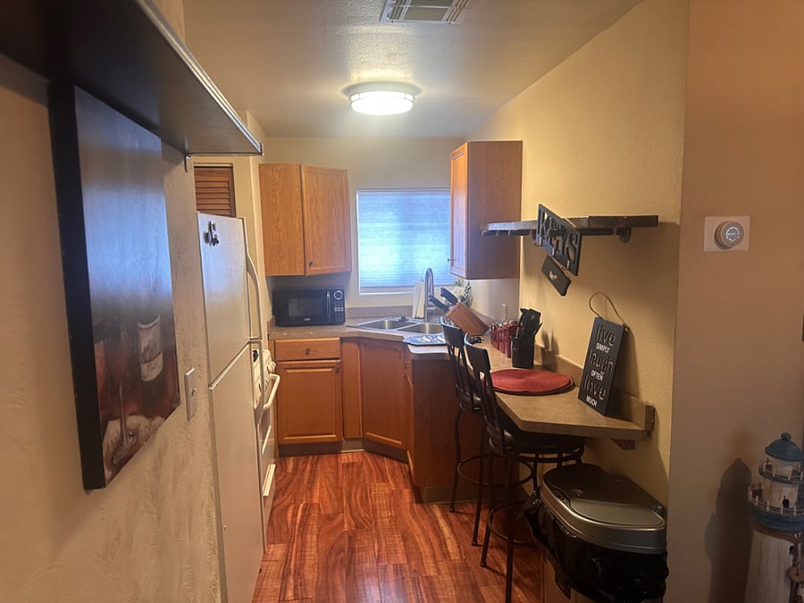 Another picture of kitchenette, with all cooking utensils.  
