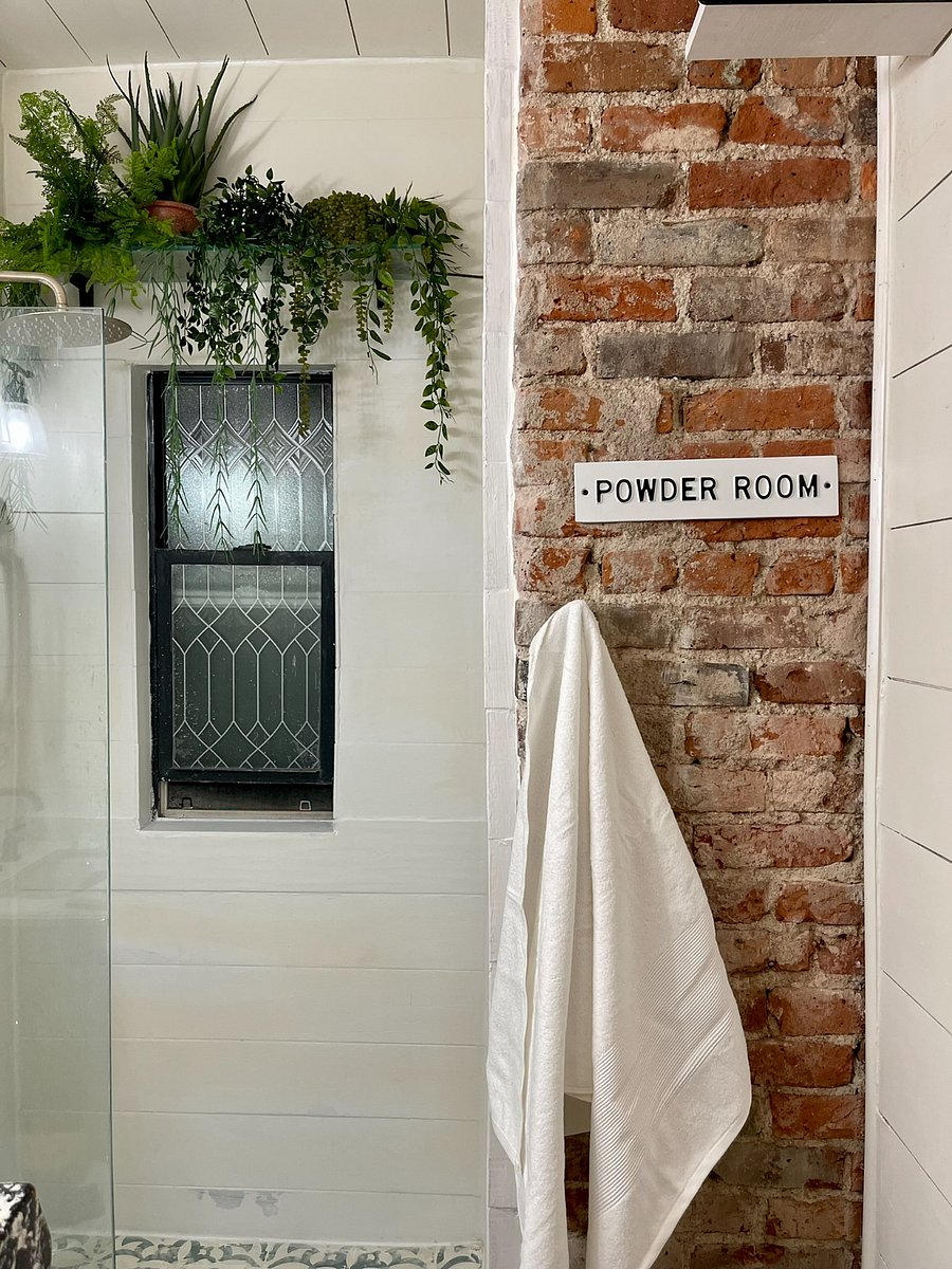 Exposed brick in bathroom