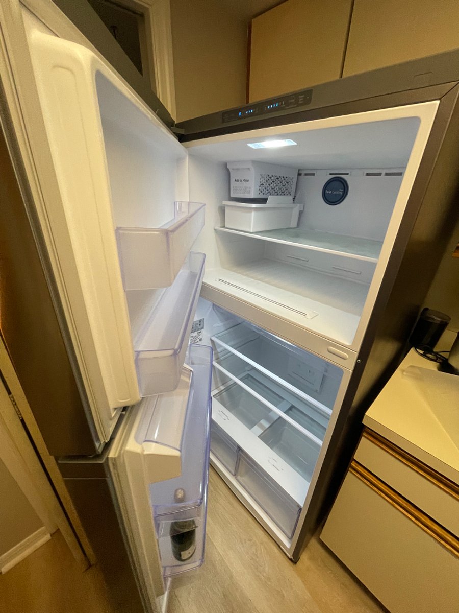 Fridge with complementary champagne bottle