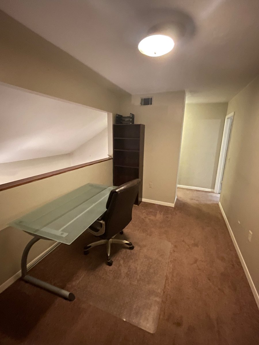Office area with bookshelve