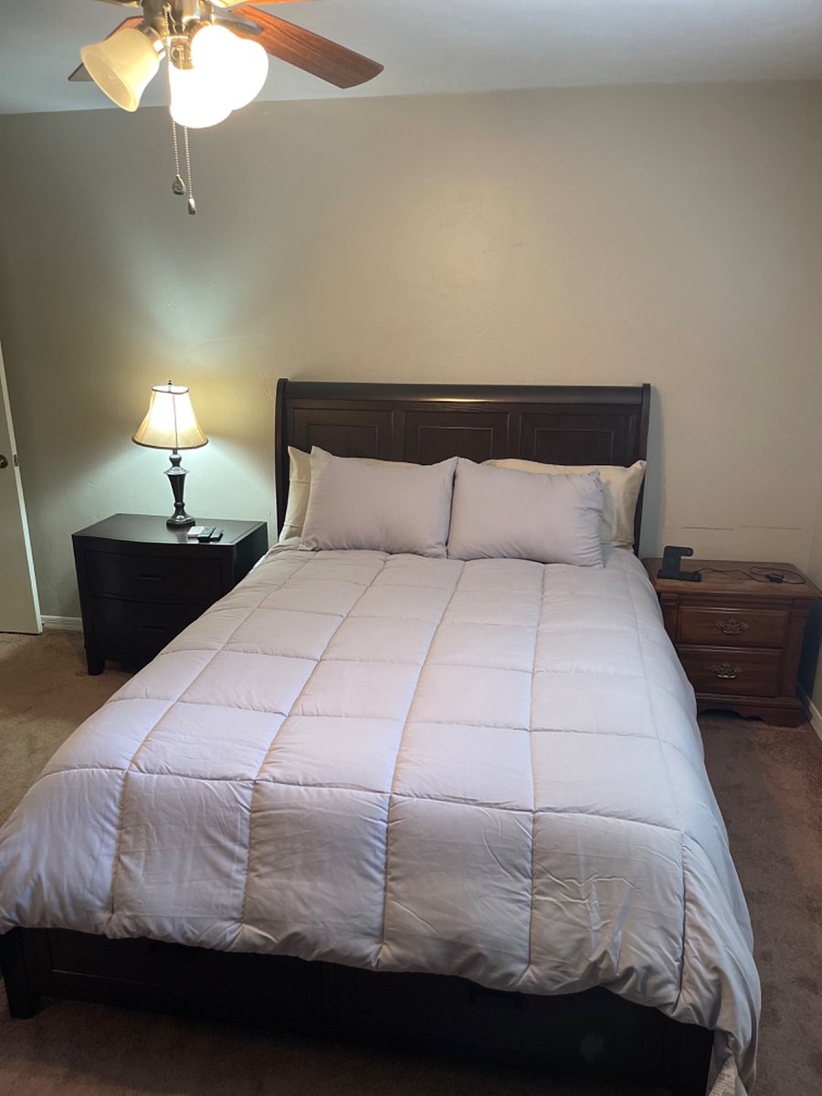 Queen bed in master bedroom