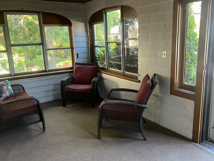 Private enclosed front porch. Nice and breezy.