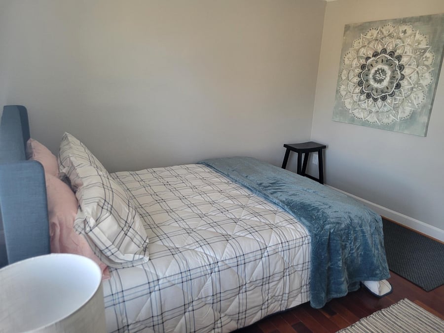 Bedroom # 2 with sliding barndoor into bedroom #3 or converts into a sitting room for a larger bedroom #2.