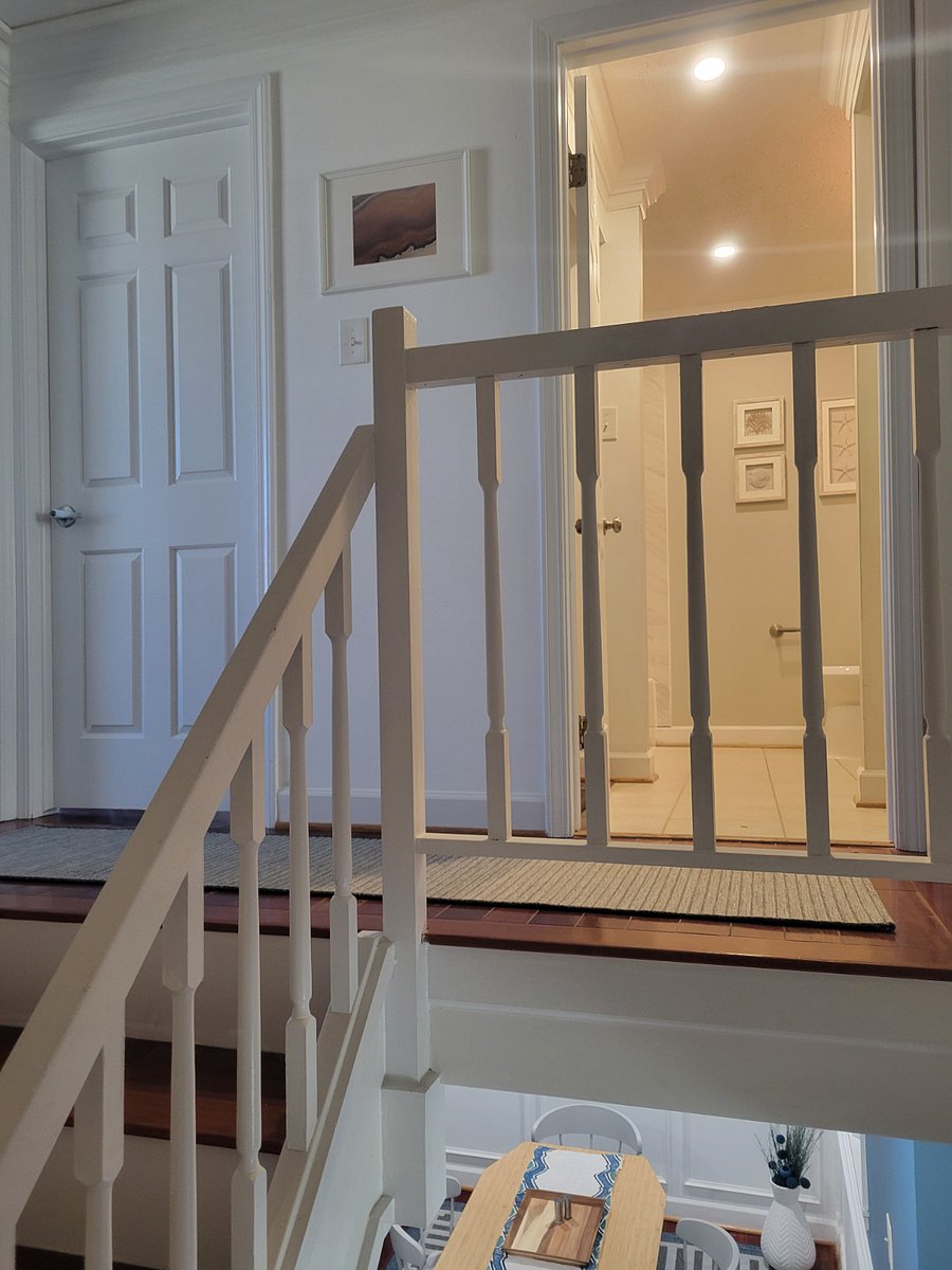 Stairs going up to bedroom suites.