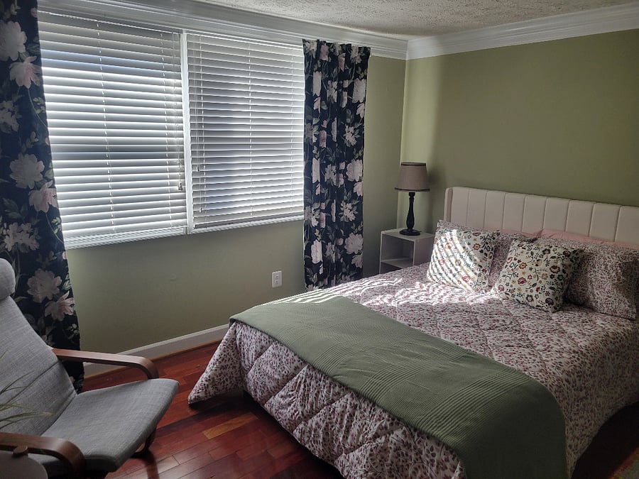 Bedroom # 1 with large Queen bed. Nice blackout curtains provided for quality sleep.