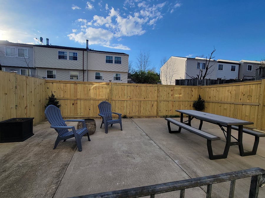 Patio has adirondack chairs and large picnic table for outdoor living and dining. Bring your own gas grill to bar-b-que outdoors!
