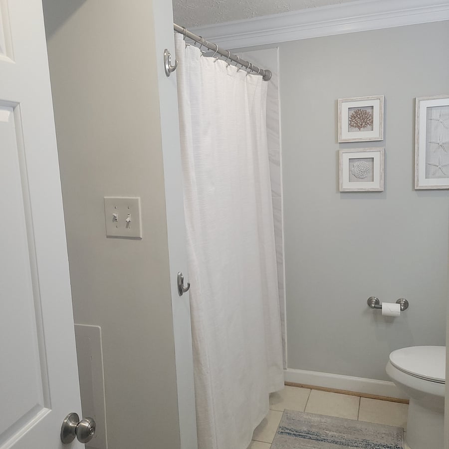 Large bathroom with shower off hallway upstairs and onsuite for bedroom #2.