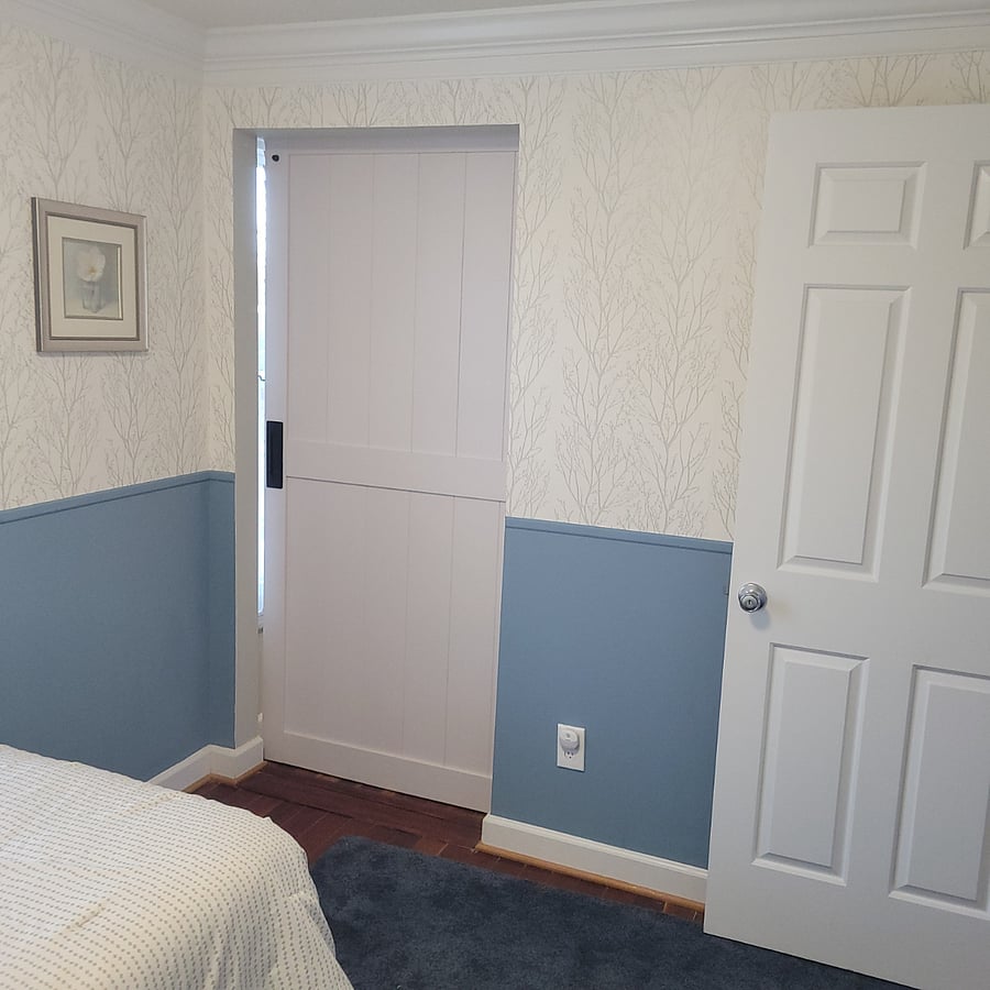 Third bedroom with single bed. Great for a small child. Barndoor separates other bedroom.