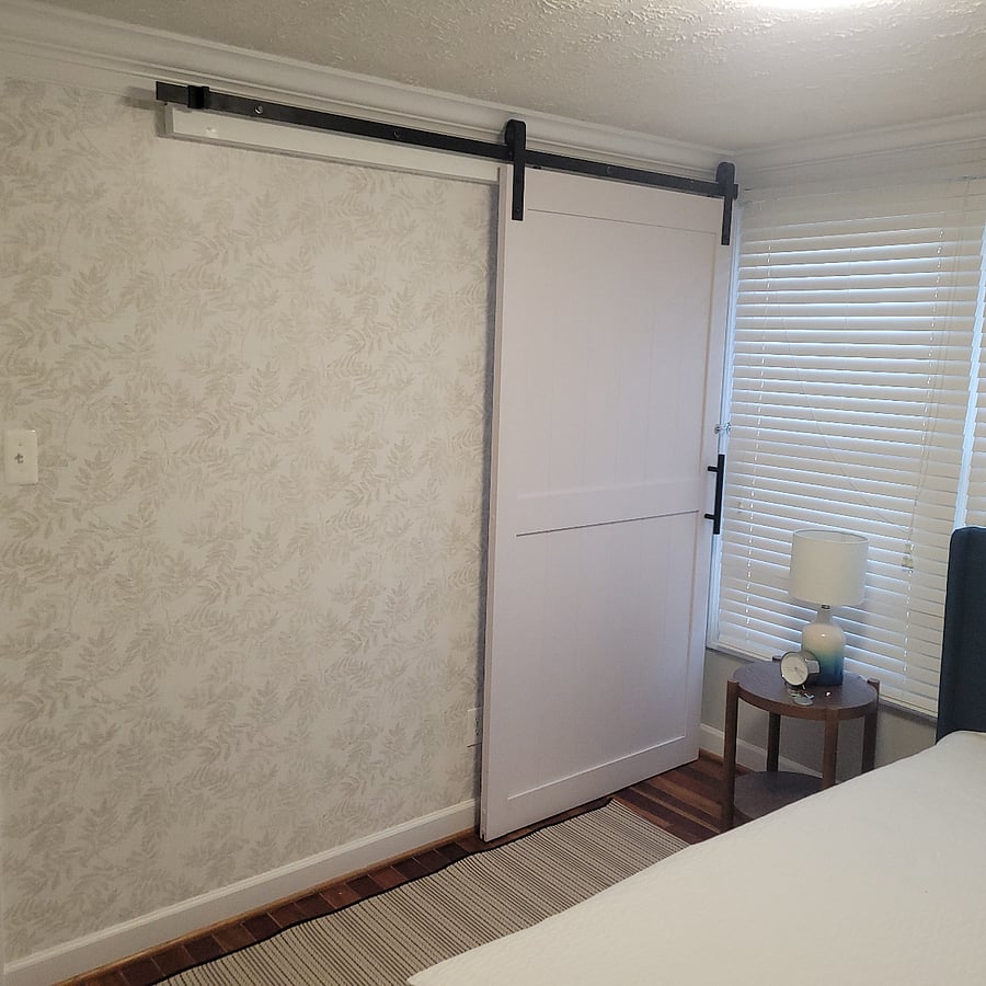 New sliding barndoor just added between bedrooms 2 & 3. Allows families to keep unit as a 3 bedroom rental or you can slide open and convert smaller 3rd bedroom into a sitting area allowing for a bigger 2nd bedroom.