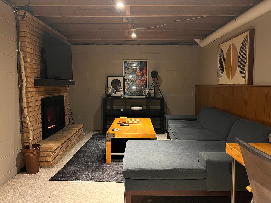 Semi-finished basement with an entertainment room with gas fireplace.