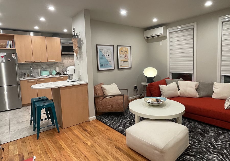 Living room area with open kitchen