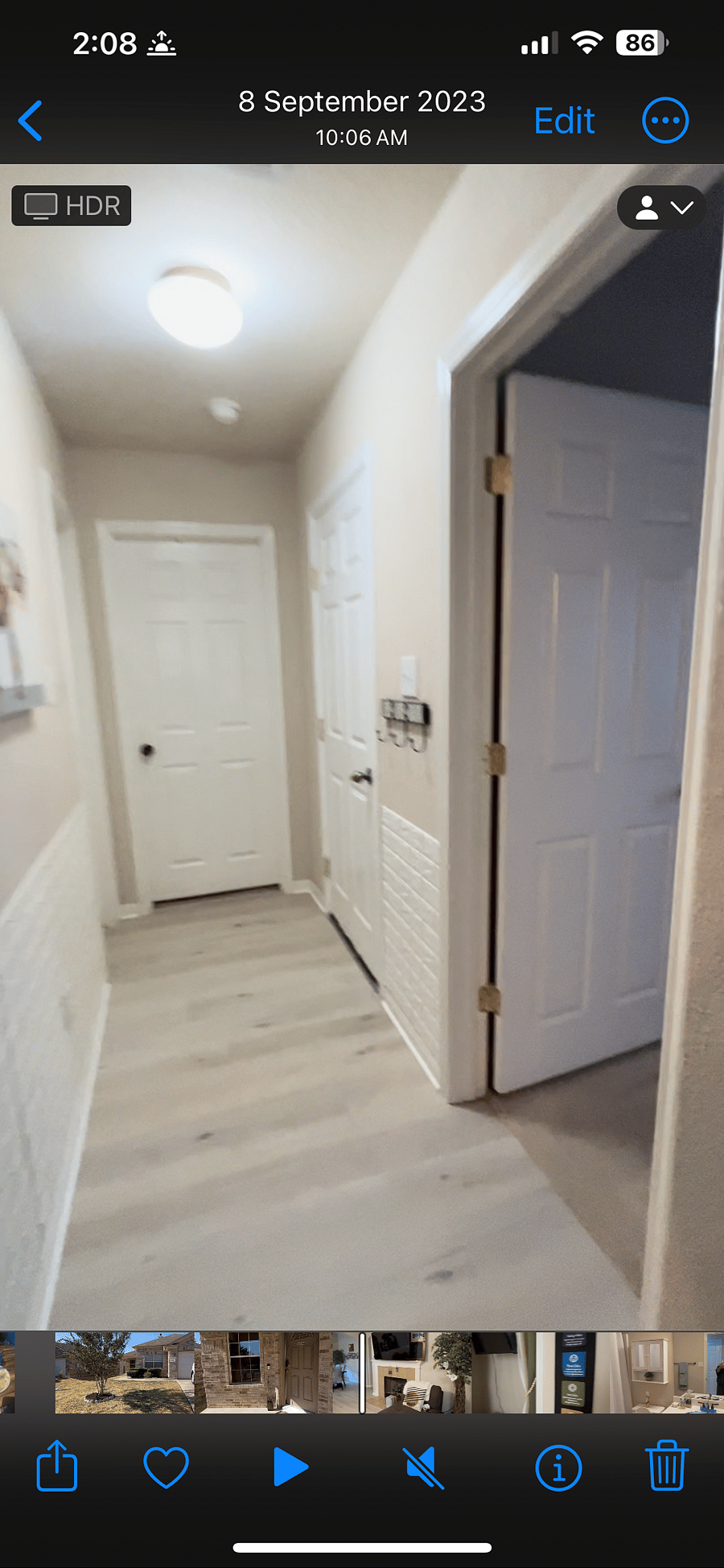 Hallway to bedroom (on the right) and bathroom (on the left).