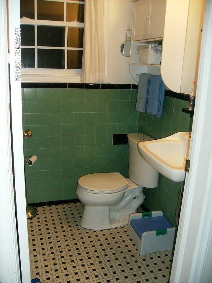 Bathroom before the much larger Ikea sink was installed (with the black faucet).