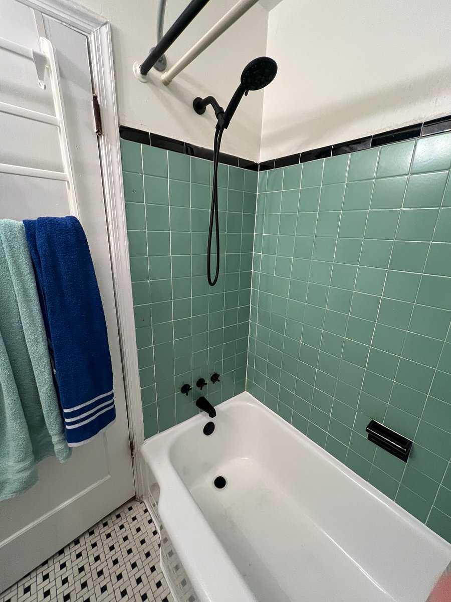 Updated bathroom with the original 1950s style.