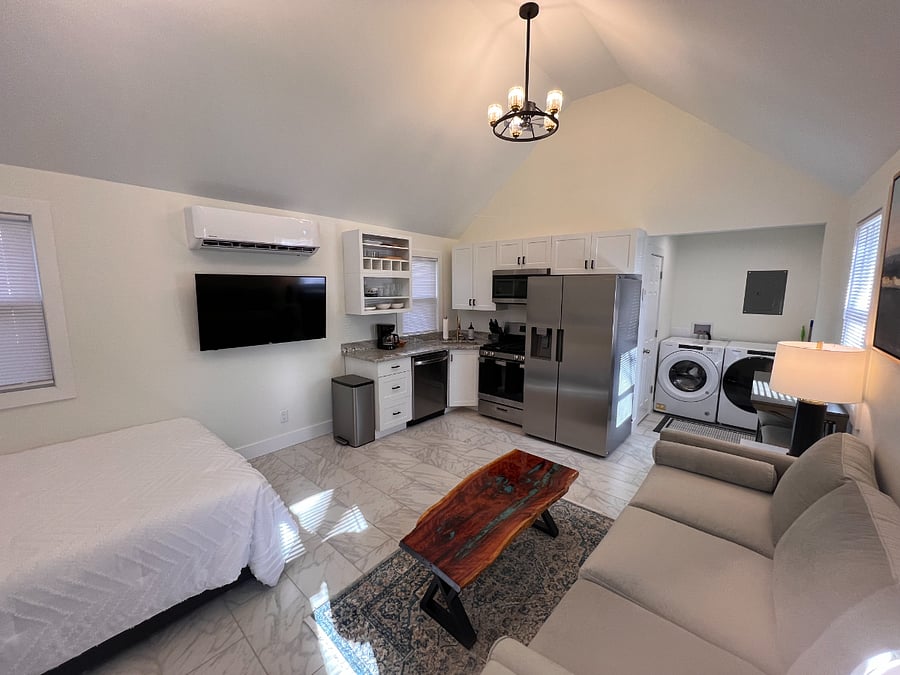 Queen bed with power and storage underneath.