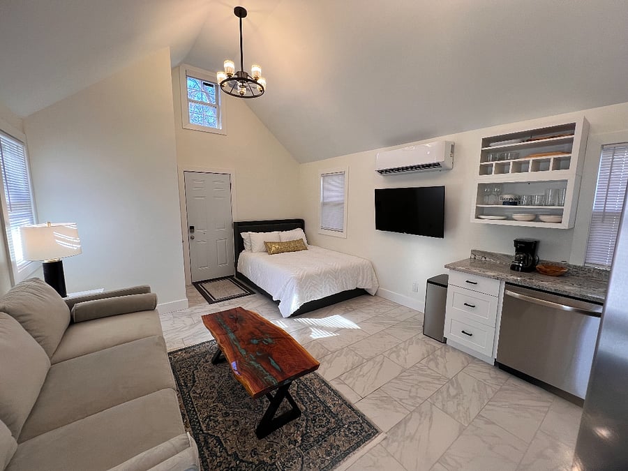 Queen bed with power and storage underneath.