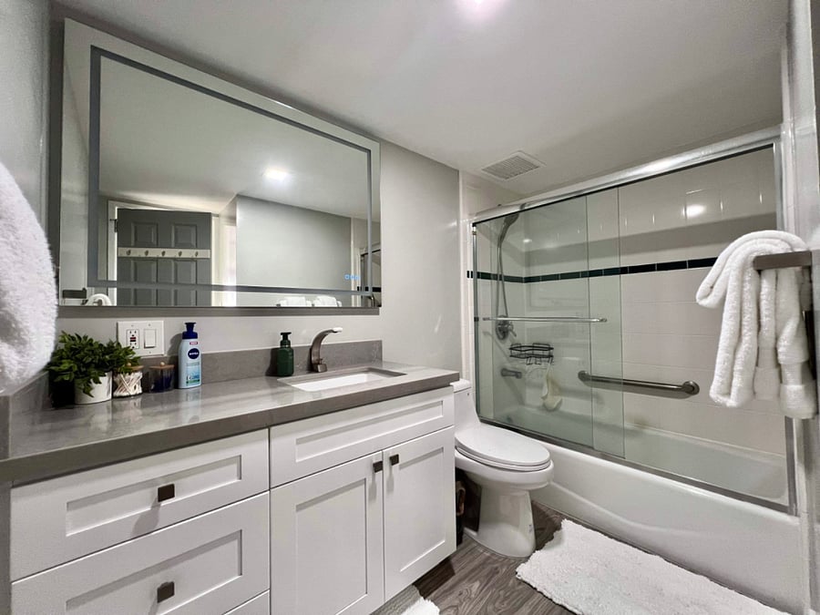 Master Bathroom with a tub and shower