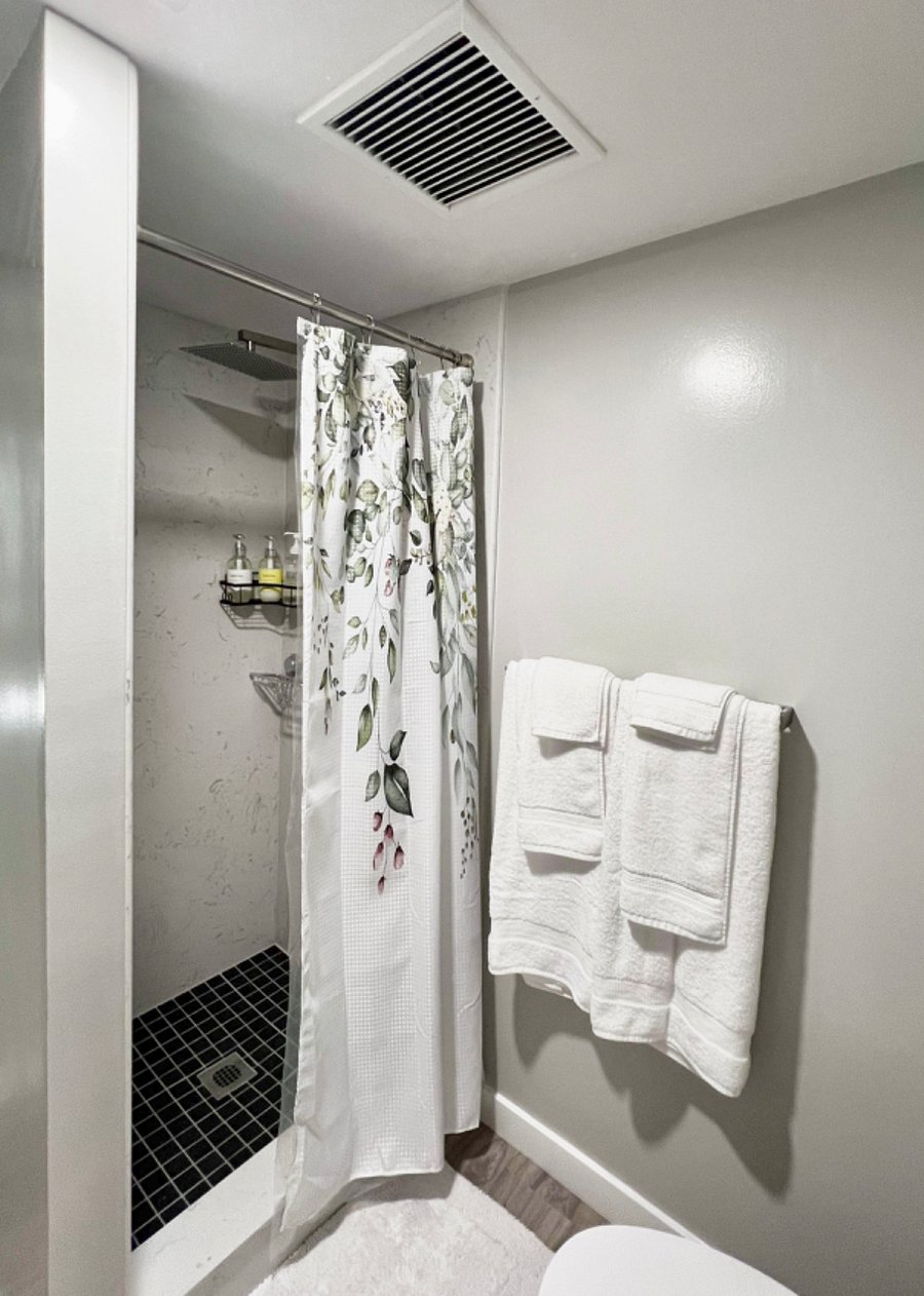 Hallway Bathroom with a shower