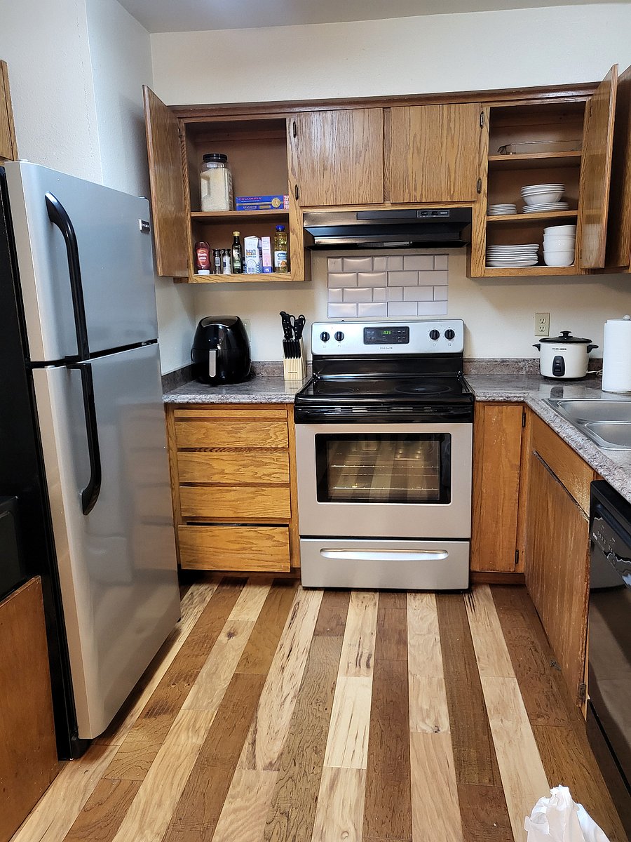 Spacious, fully-appointed kitchen complete with Keurig, air fryer, Insta-Pot, rice cooker, toaster, toaster oven, and convection cooker, plus starter kitchen supplies.