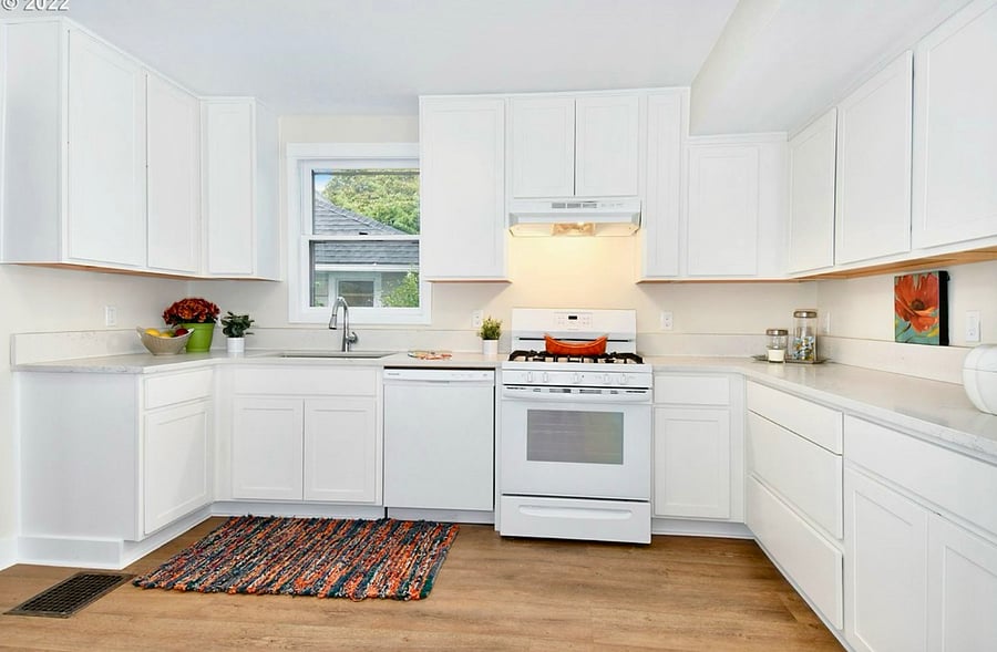 kitchen with granite counter tops and new cabinets