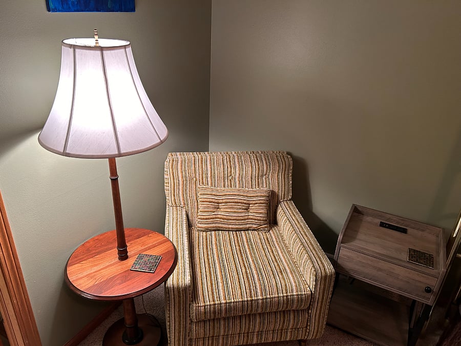 Lounge Chair with Side Lamp Table to relax from a long day.