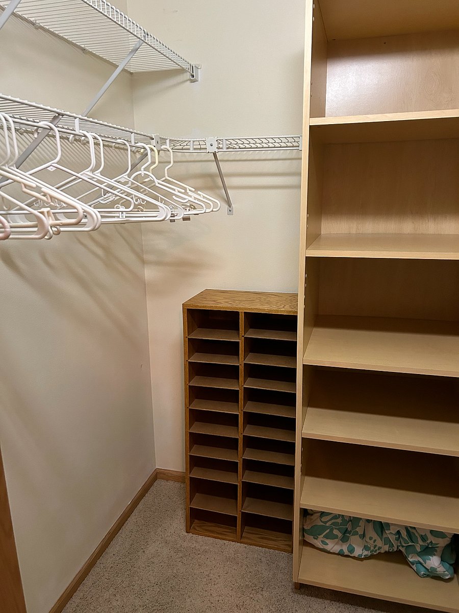 Shoe condo in walk-in closet