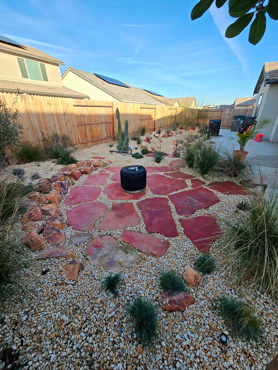 A common area outside with a firepit. Chairs not shown.
