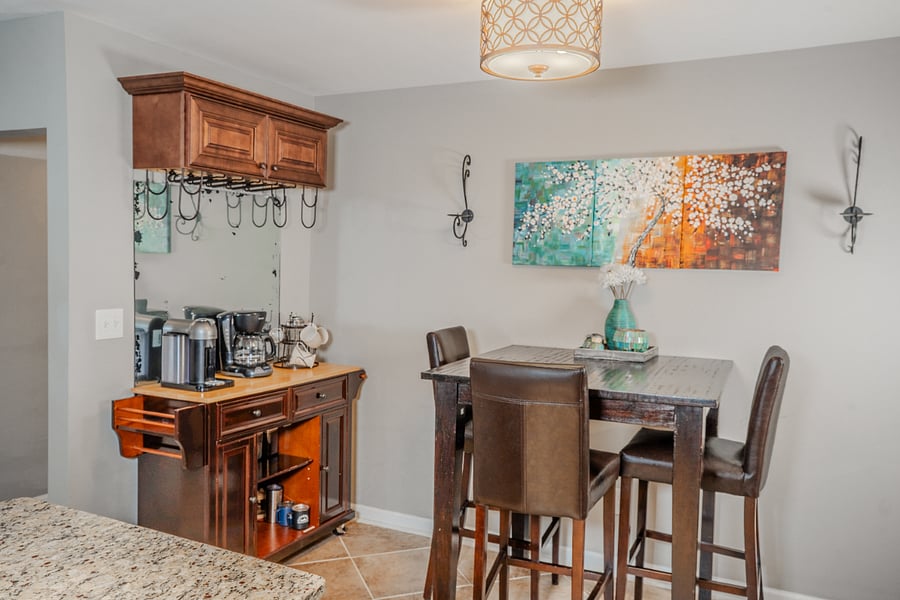 Kitchen/dining area. Seats 4 at table and 2 at the island