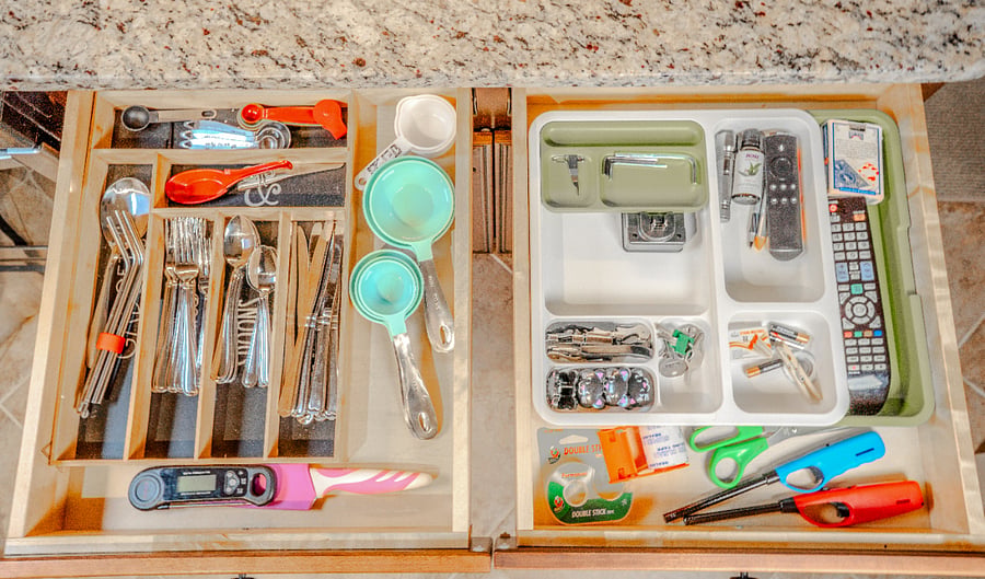 Silverware, measuring cups, and accessories.