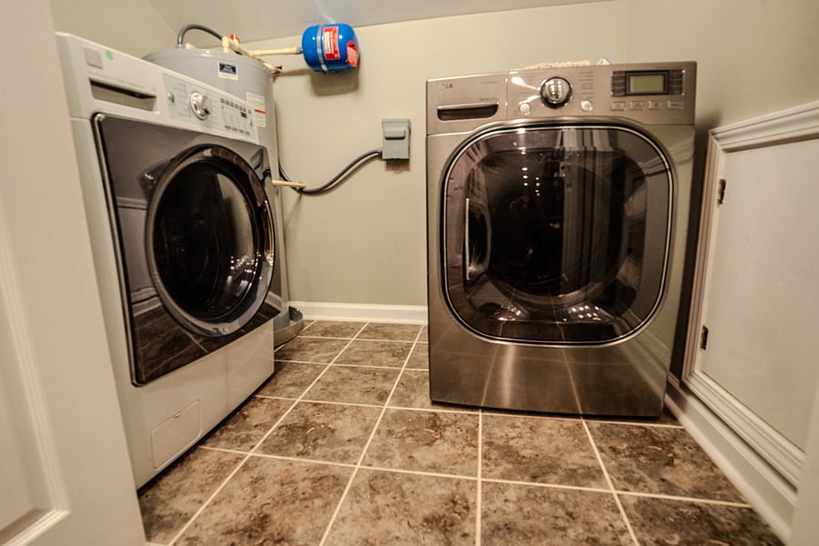 Washer and dryer attached to the primary bathroom.