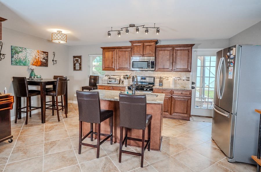 Kitchen with counter height bar chairs