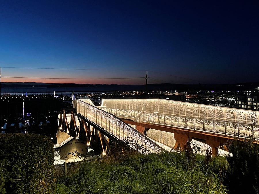 Grand Ave Park Bridge to the waterfront. Many restaurants & bars, live music in the summer, access to Jetty Island Ferry and various events.