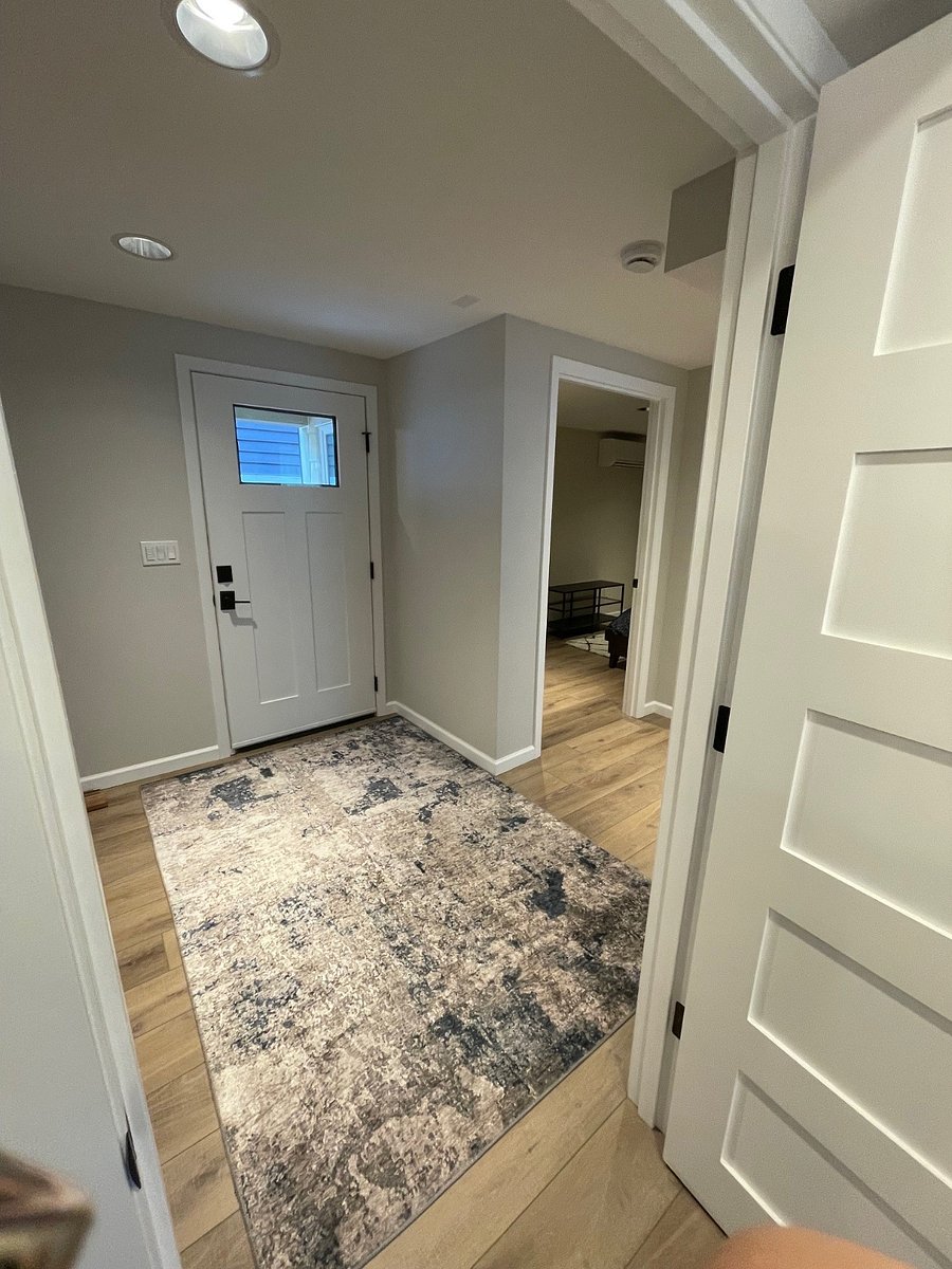 Looking at front door from bathroom.