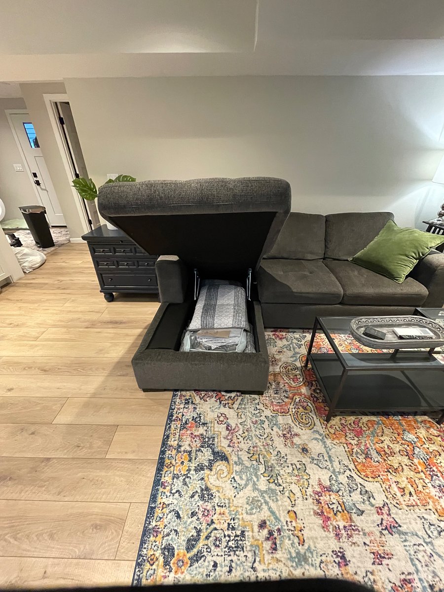 Where bedding is stored in case you have a guest, they can sleep on the pull out sofa.