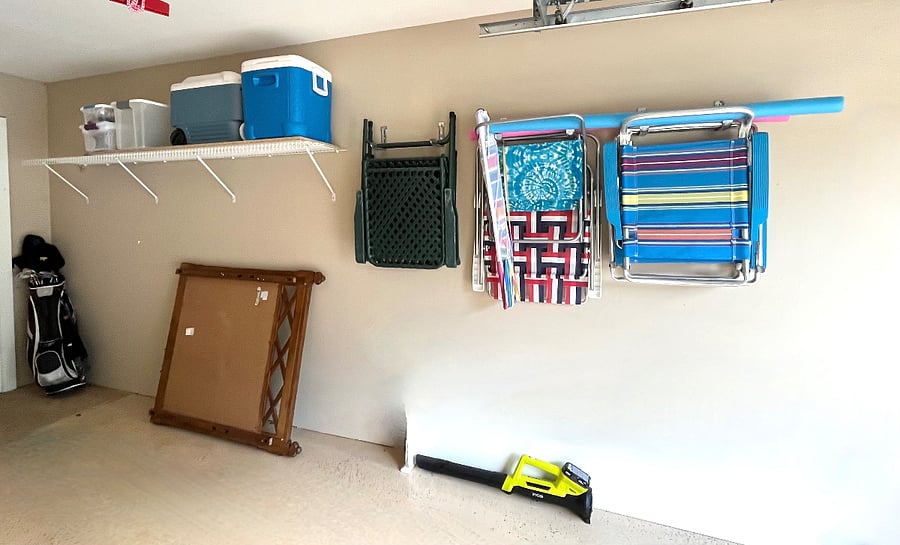 Private garage with beach chairs, coolers and 2 bikes.
