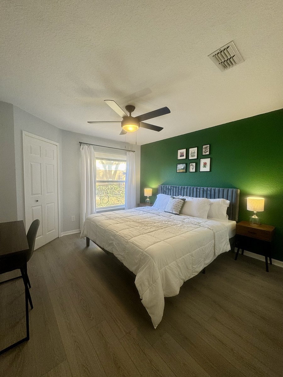 Premium mini blinds and black out curtains offer maximum light control. There is USB charging and and outlets built into the nightstands. The bedroom also features a desk with a laptop riser and a large walk-in closet.