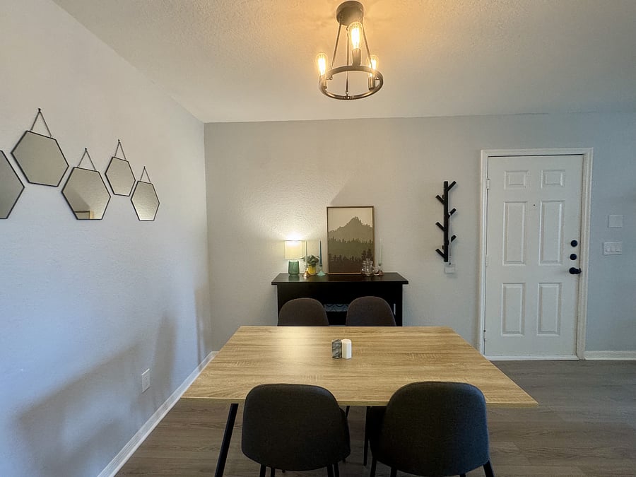 Dine in comfort on plush mid-century modern chairs.