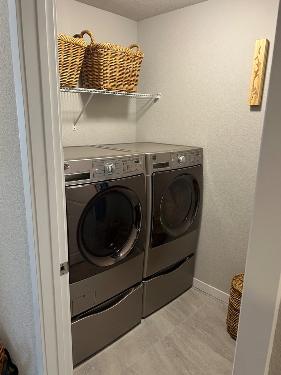 Upstairs washer and dryer near bedrooms.