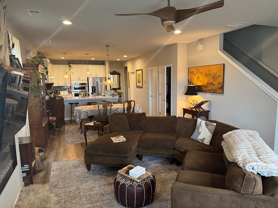 Main level also includes coat closet, half bath, pantry, and storage closet.