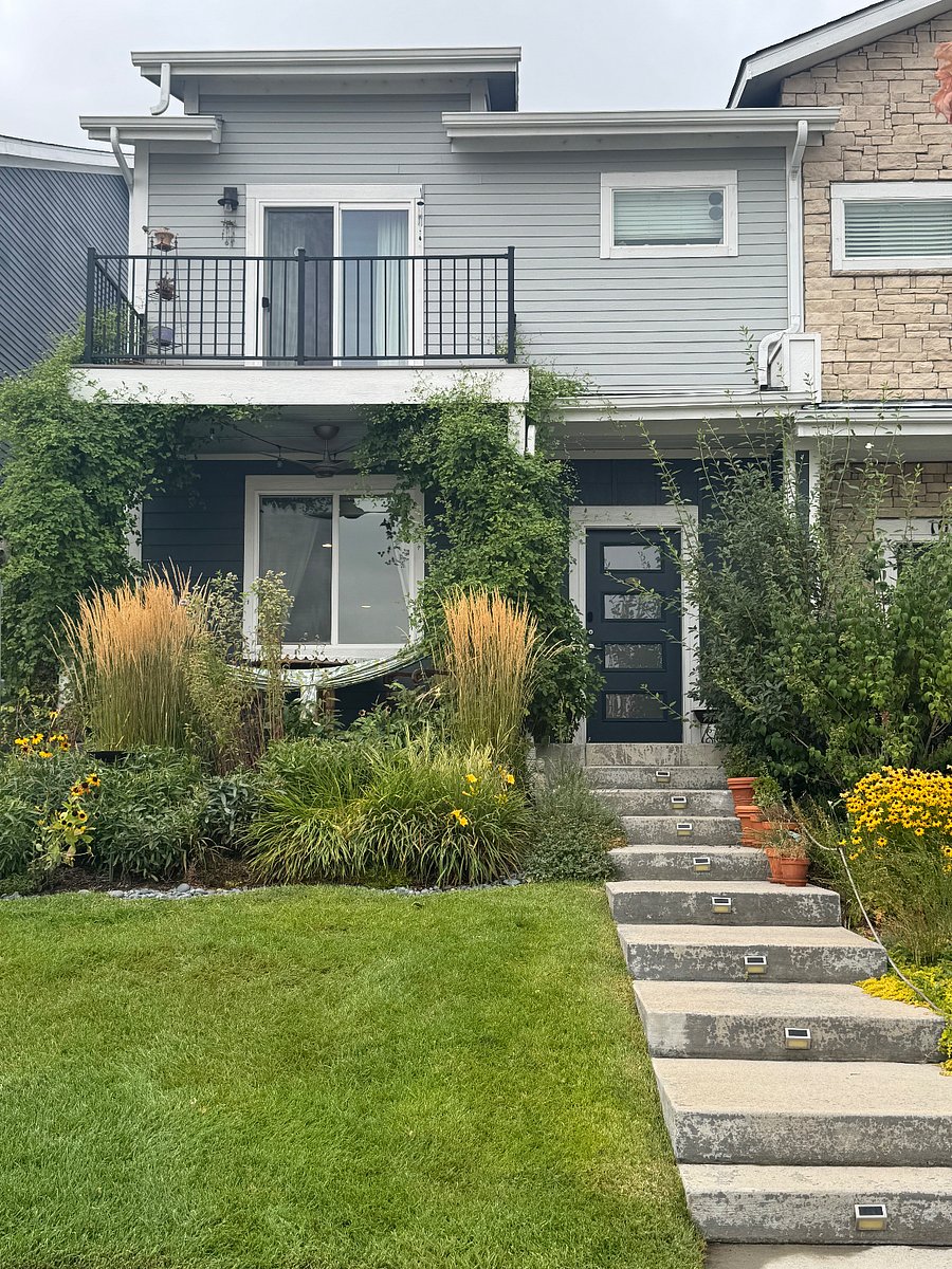 Spacious condo in well maintained West Grange Villas HOA with peaceful front porch overlooking perennial flower garden.