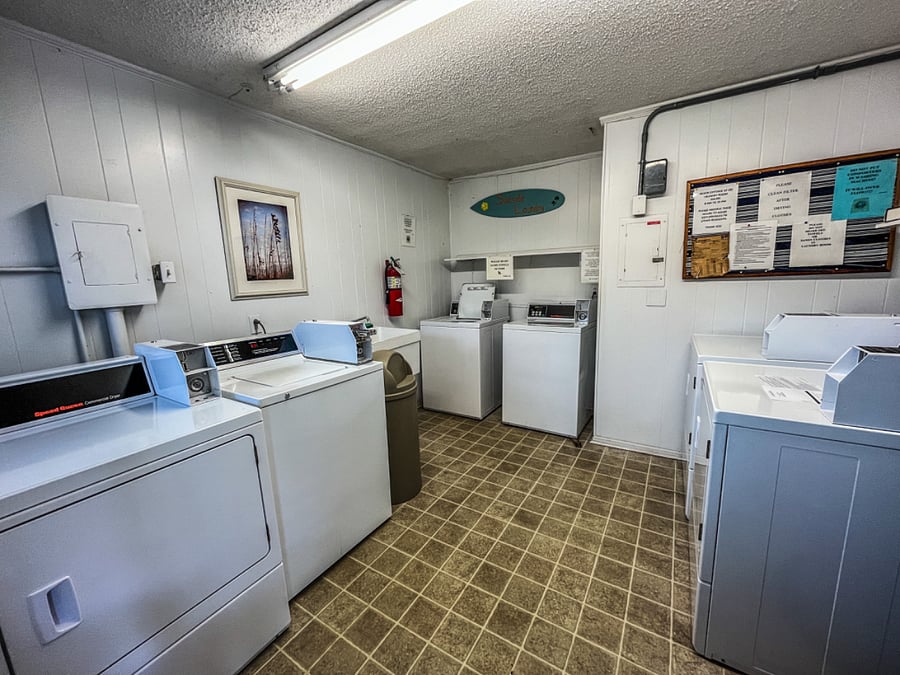 shared laundry space-washers, dryers and folding area