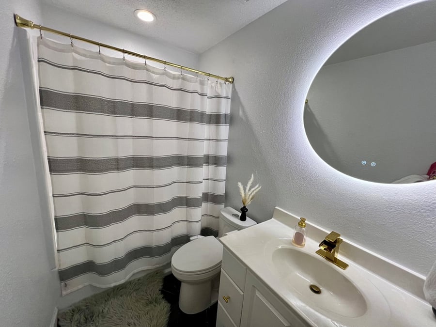 Bathroom attached to primary bedroom