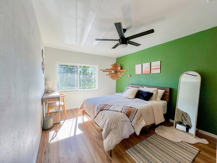OPTION 2: Bedroom 2 MCM Boho Theme (Please check availability with landlord)

Includes: a comfy queen bed, linens, bath towels LED nightstand with phone charging port & USB outlets, desk, touch lamp with usb ports, a desk chair, live plants and an essential diffuser to purify the air (Essential oils not included).