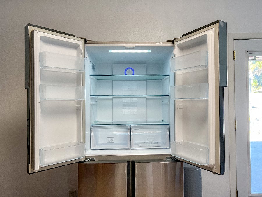 brand new refrigerator with divided freezer sections