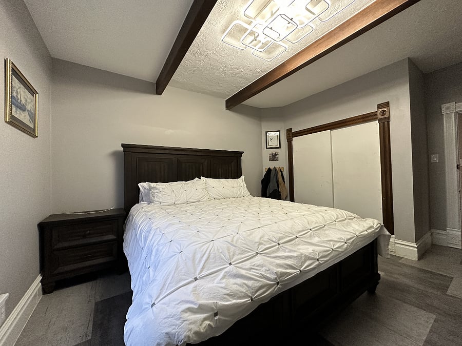 Primary bedroom with king sized bed